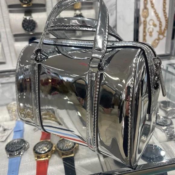 MICHAEL KORS Jet Set Small Patent Duffel Xbody Crossbody Bag
Silver 
NWT - Picture 11 of 16